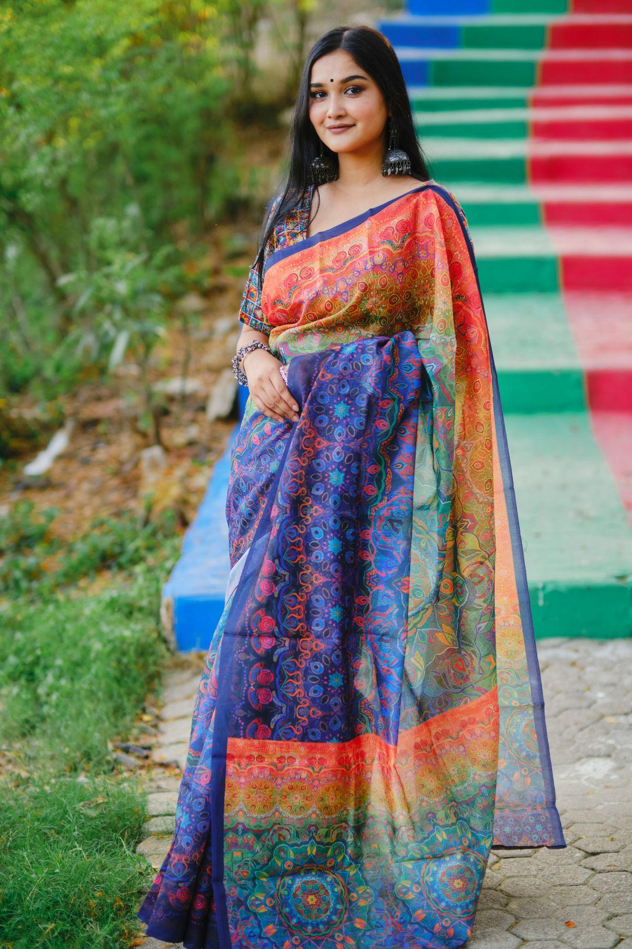 a beautiful woman in a colorful sari